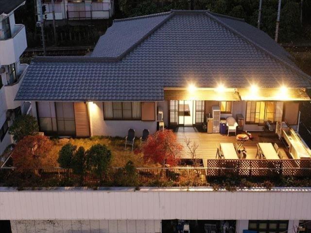 海と駅の近くのゲストハウス海悠 Ито Экстерьер фото